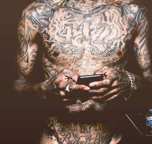 Chest Full Of Ink Tattoo